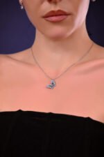 The purity blue butterfly necklace.